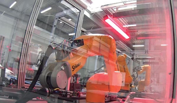 Multiple robots assembly cell